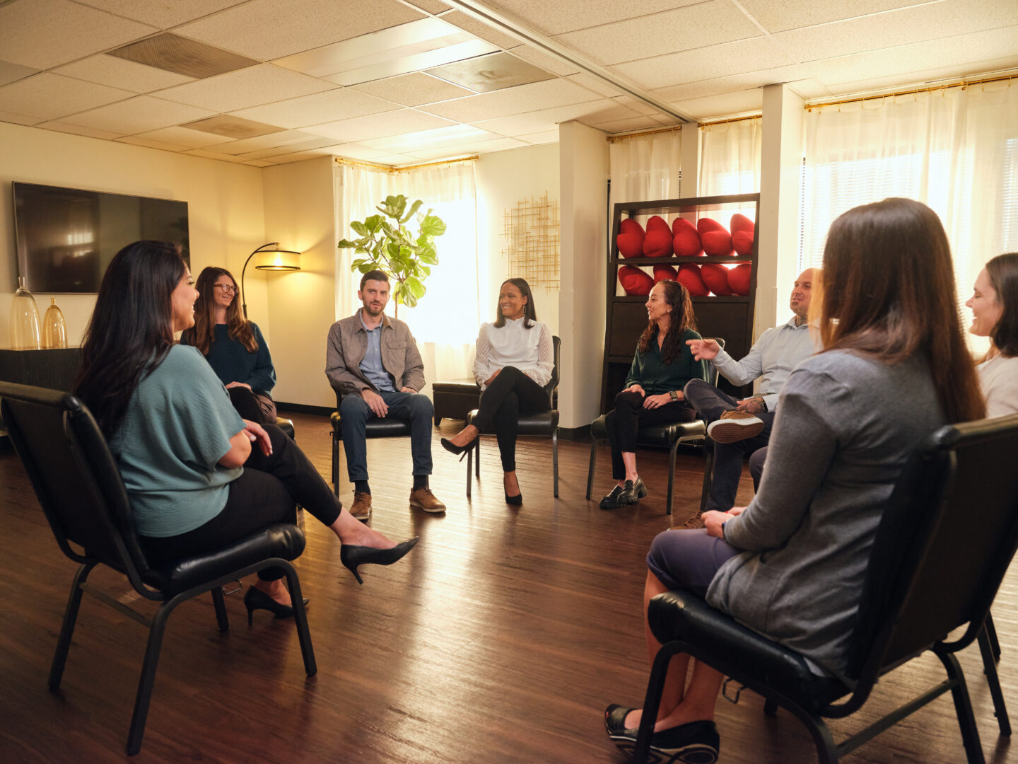 Peers sharing in a group therapy circle